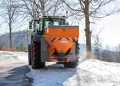 AccoSat in winter service use with salt spreader from Rauch