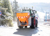 AccoSat in winter service use with salt spreader from Rauch